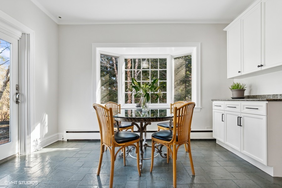 730 Sheridan Road Wilmette, IL 60091 - Photo 15 of 43 a dining room with furniture and window