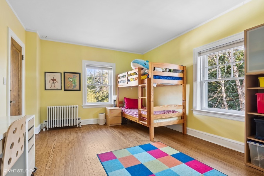 730 Sheridan Road Wilmette, IL 60091 - Photo 28 of 43 a bedroom with furniture and a window