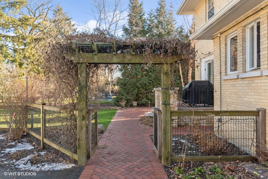730 Sheridan Road Wilmette, IL 60091 - Photo 3 of 43 a front view of a house with a yard