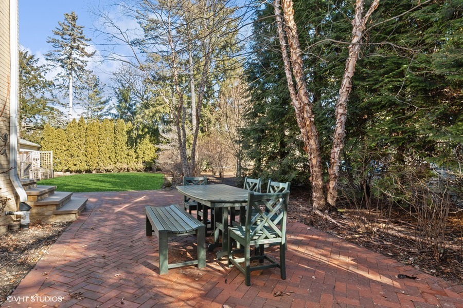 730 Sheridan Road Wilmette, IL 60091 - Photo 36 of 43 a view of a table and chairs in backyard