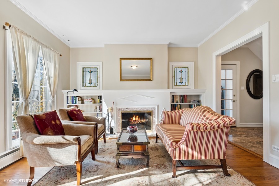 730 Sheridan Road Wilmette, IL 60091 - Photo 8 of 43 a living room with furniture and a fireplace