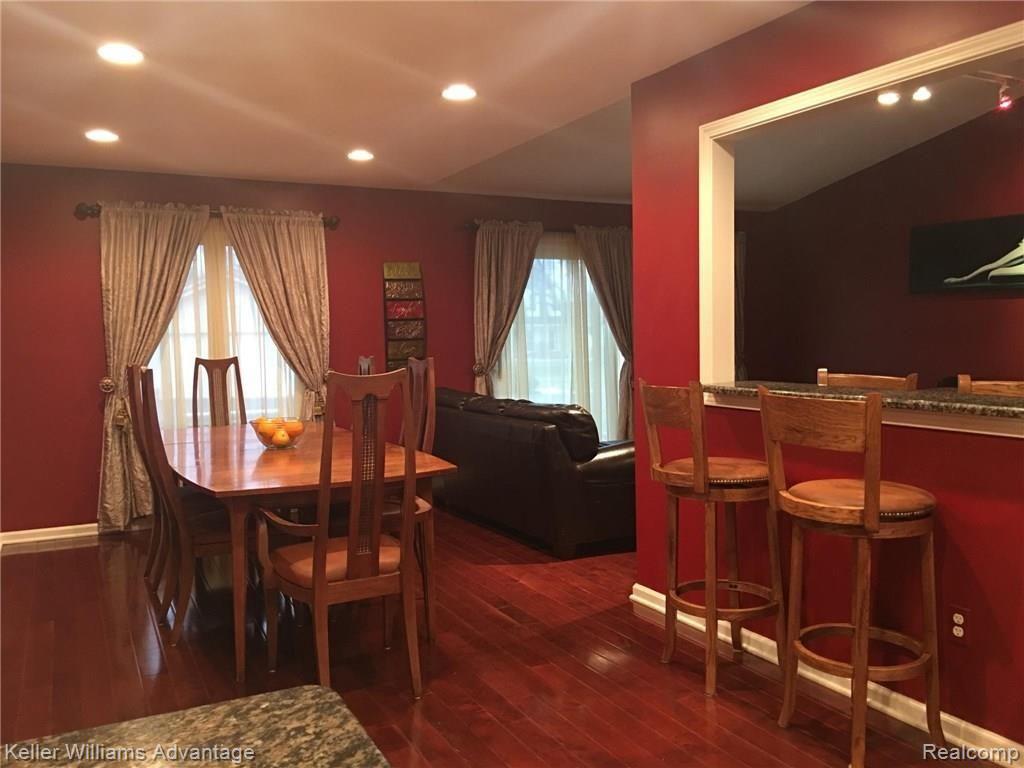29911 High Valley Road Farmington, MI 48331 - Photo 17 of 53 Dining area with breakfast bar.