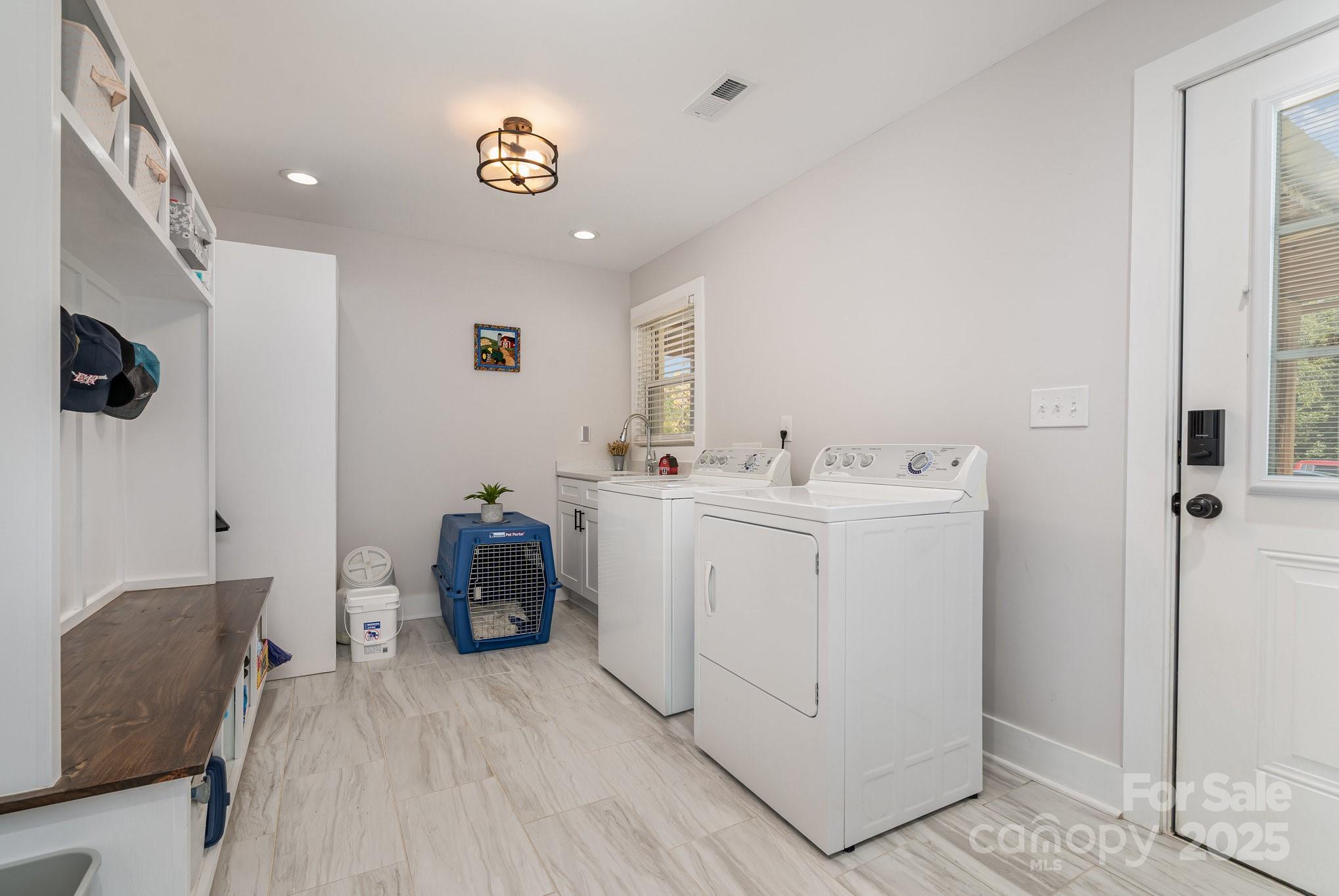 2295 Emanuel Church Road Rockwell, NC 28138 - Photo 16 of 33 a utility room with dryer and washer
