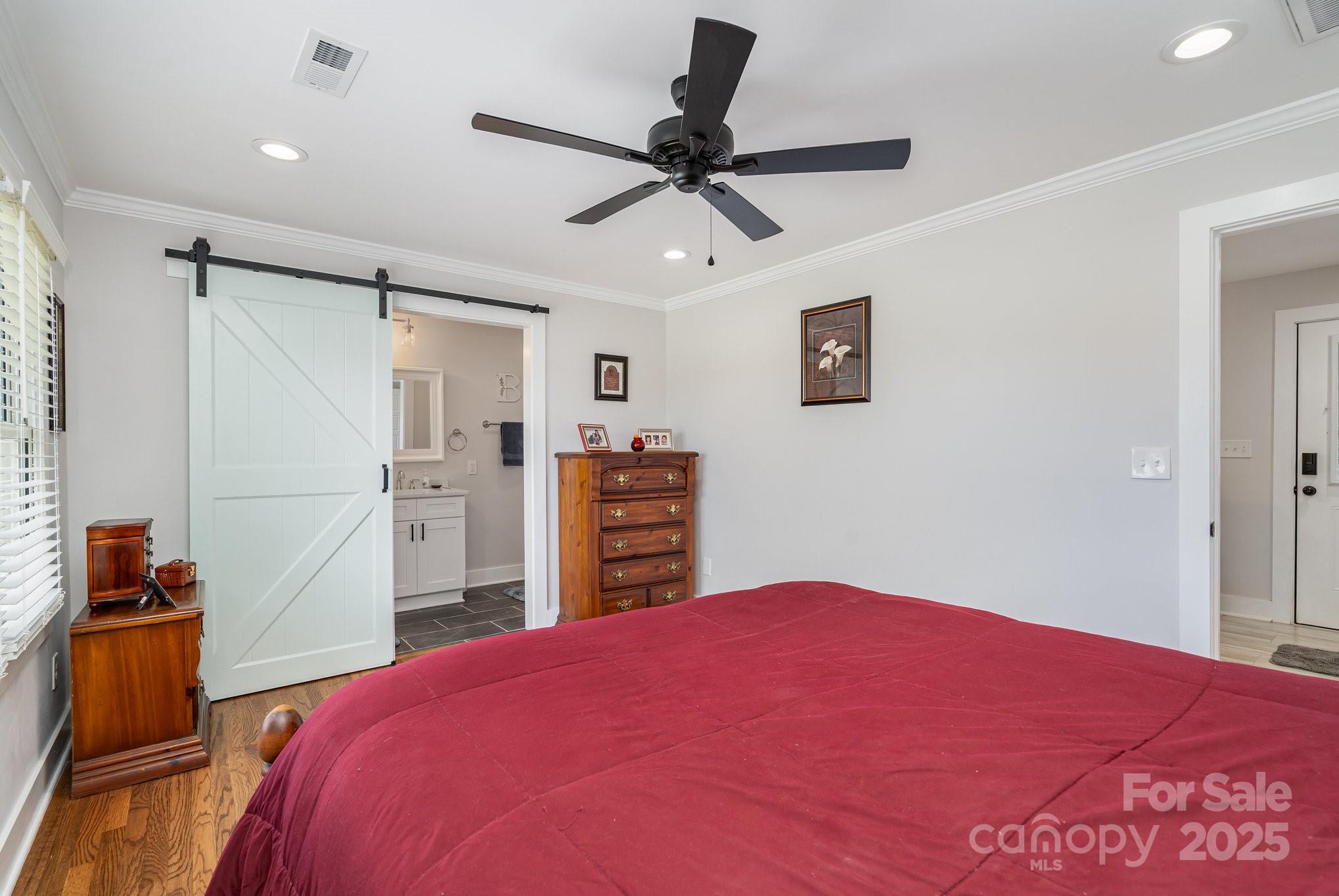 2295 Emanuel Church Road Rockwell, NC 28138 - Photo 18 of 33 a bedroom with a bed and a closet