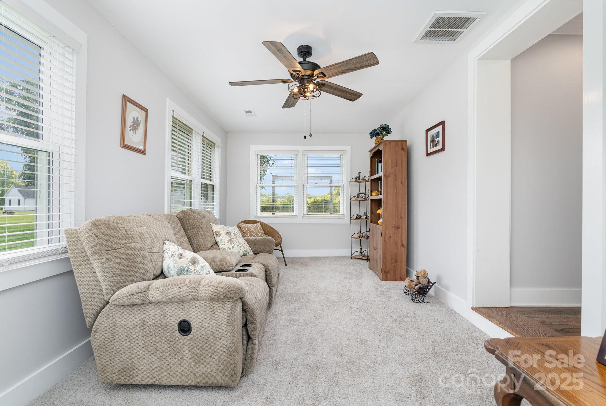 2295 Emanuel Church Road Rockwell, NC 28138 - Photo 25 of 33 a living room with furniture and window