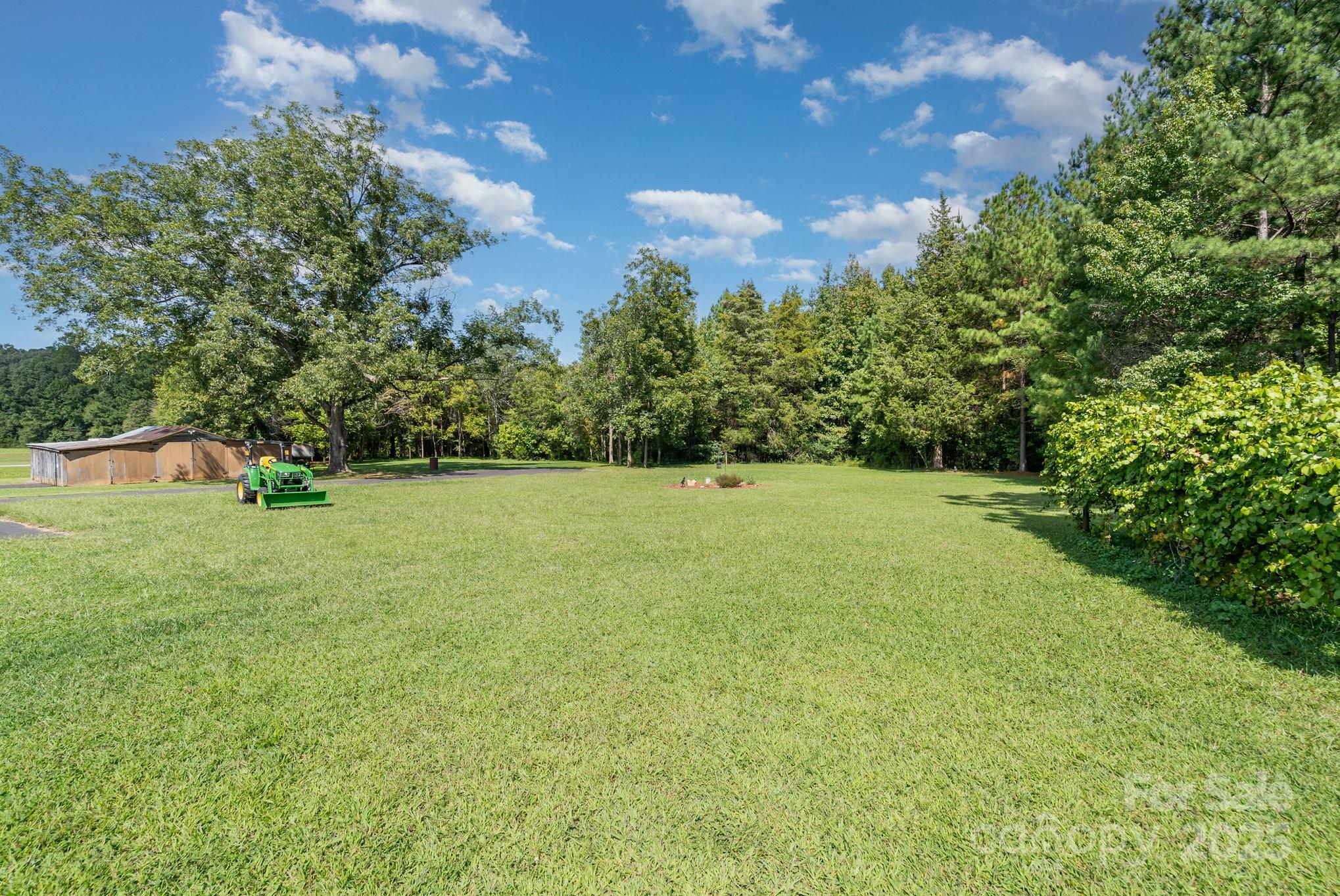 2295 Emanuel Church Road Rockwell, NC 28138 - Photo 30 of 33 a view of yard with green space