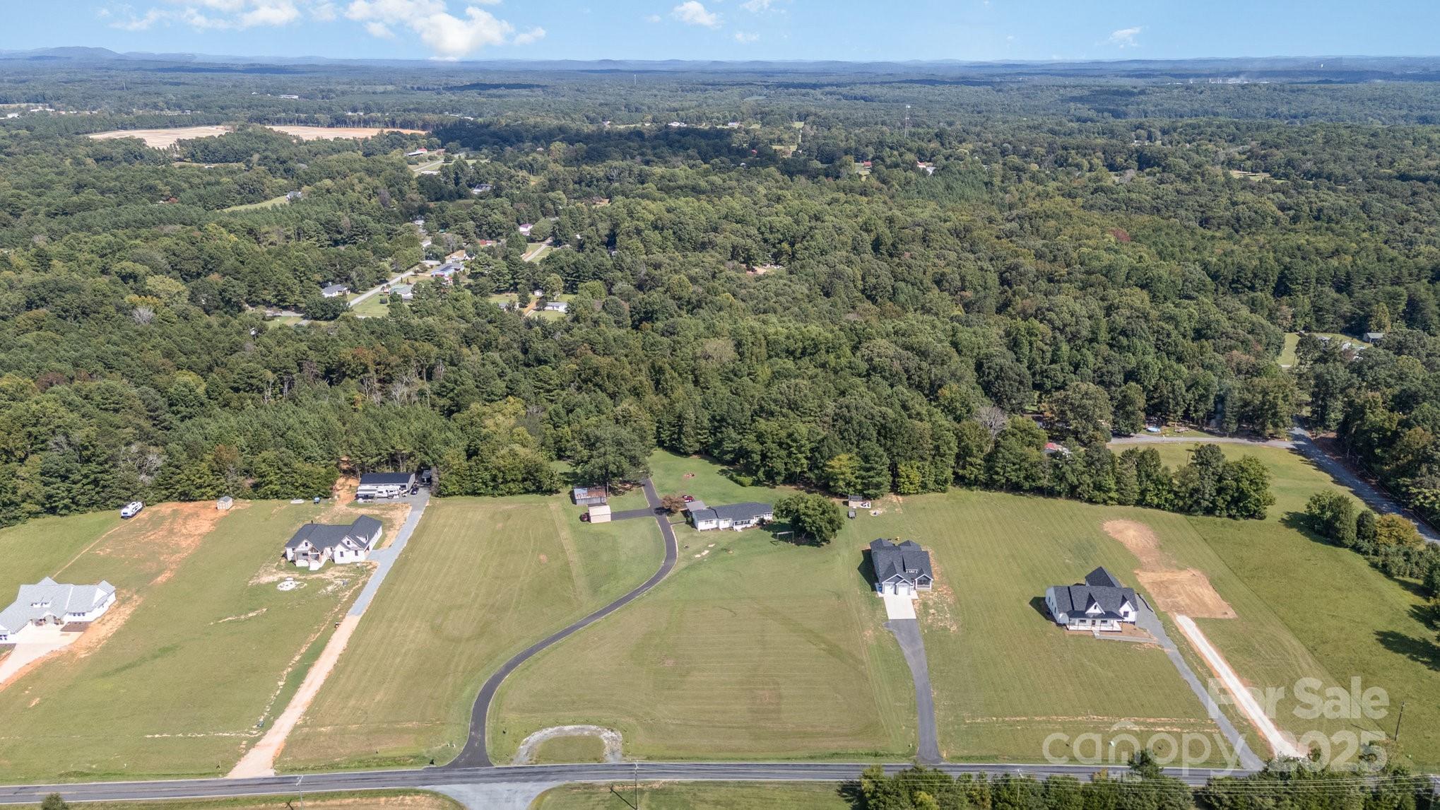 2295 Emanuel Church Road Rockwell, NC 28138 - Photo 32 of 33 an aerial view of a house