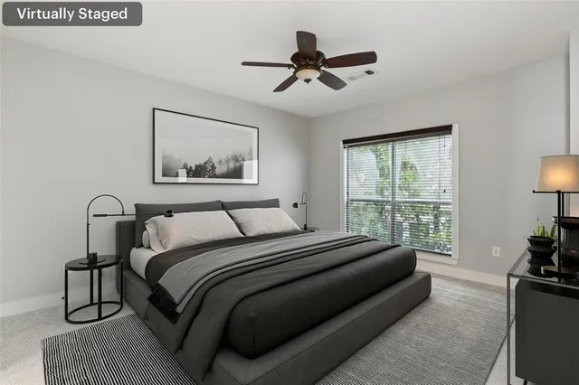 a bed room with a bed and a couch