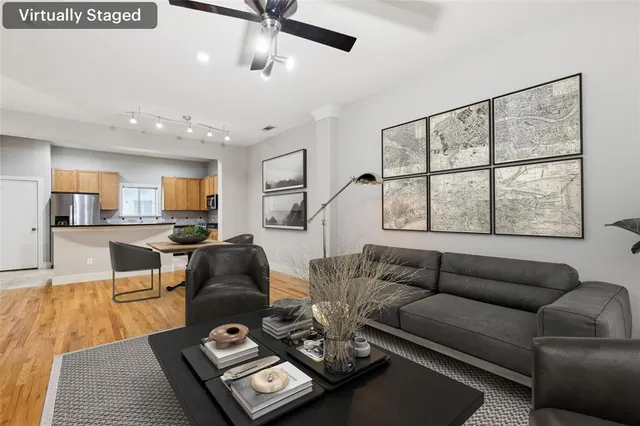 a living room with furniture and a window
