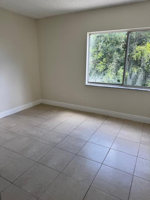 537 Northwest 46th Avenue Delray Beach, FL 33445 - Photo 17 of 20 an empty room with a window