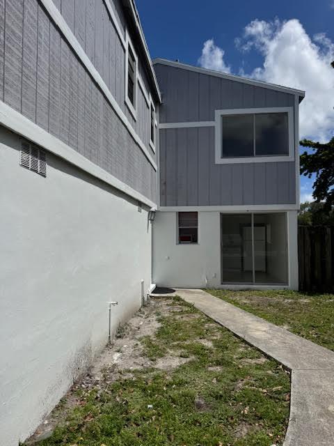 537 Northwest 46th Avenue Delray Beach, FL 33445 - Photo 2 of 20 a view of an house with backyard and kitchen