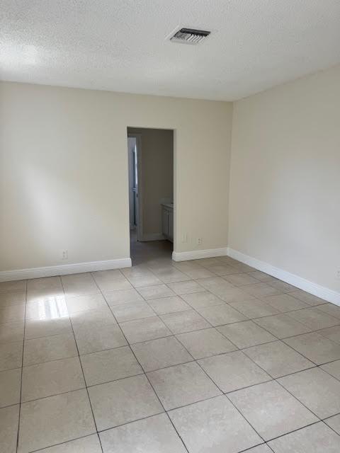537 Northwest 46th Avenue Delray Beach, FL 33445 - Photo 8 of 20 a view of an empty room with a window