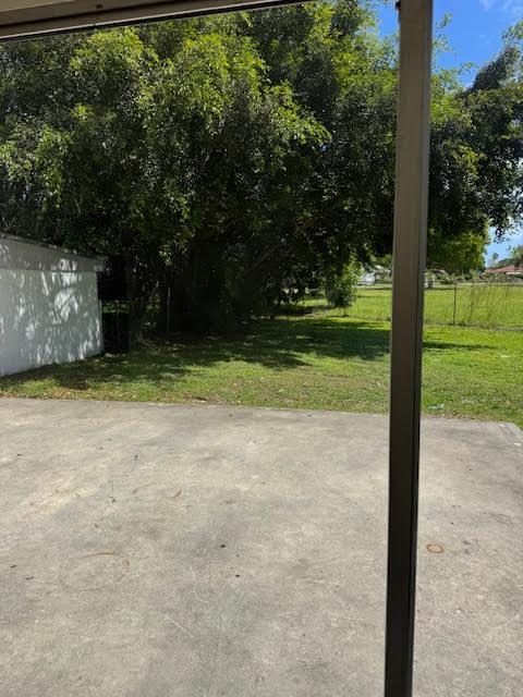 537 Northwest 46th Avenue Delray Beach, FL 33445 - Photo 10 of 20 a view of a yard