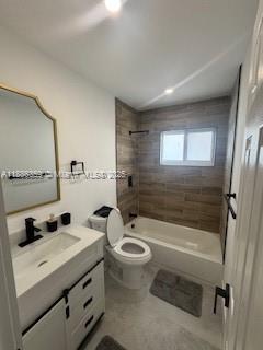 2201 Northwest 6th Court, Unit 2201 Fort Lauderdale, FL 33311 - Photo 7 of 8 a bathroom with a granite countertop sink a toilet a mirror and shower