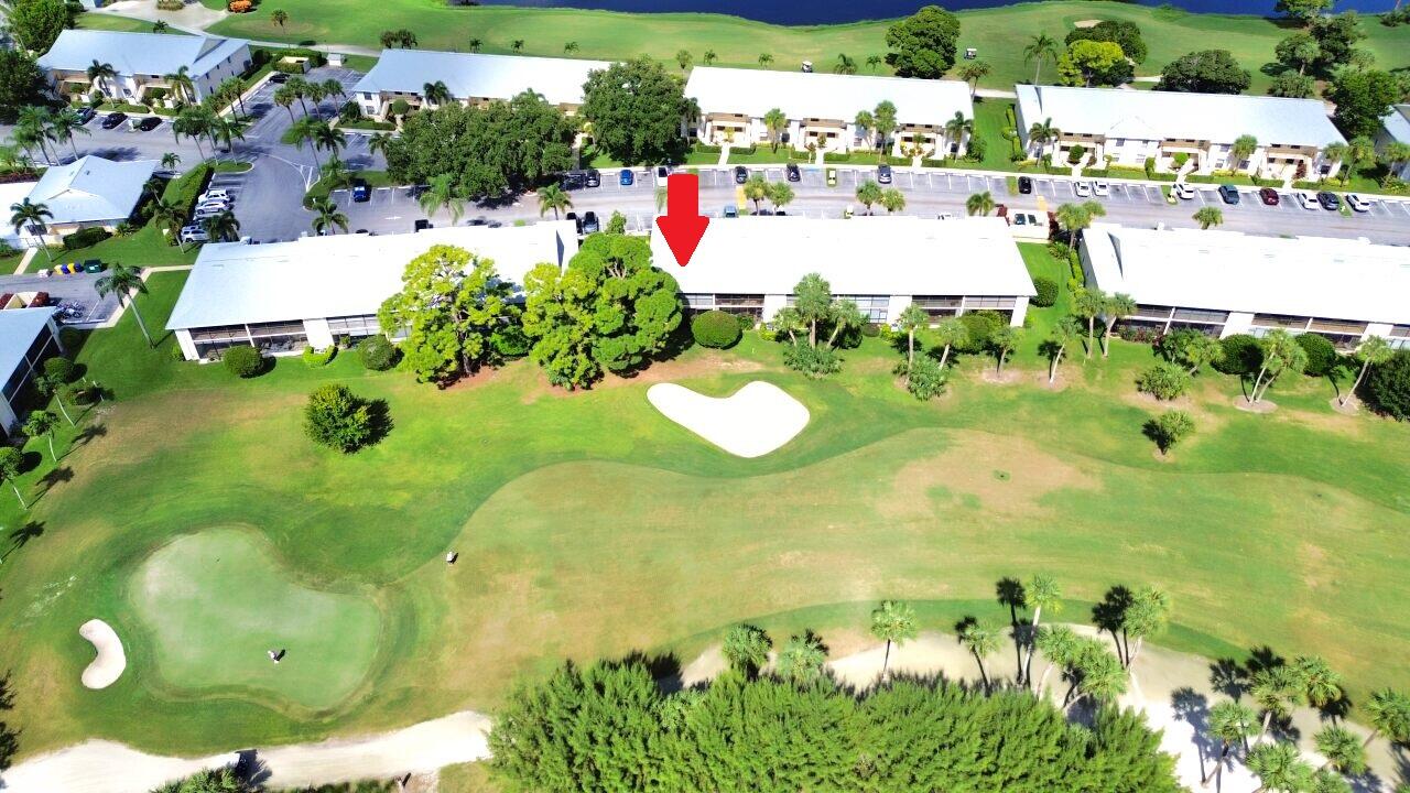 1101 Keystone Drive, Unit F Jupiter, FL 33458 - Photo 19 of 36 DJI_0844 w.arrow