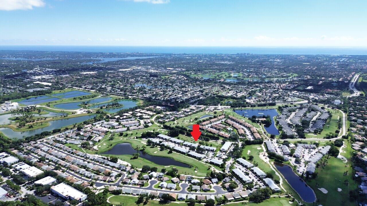 1101 Keystone Drive, Unit F Jupiter, FL 33458 - Photo 21 of 36 DJI_0849 w.arrow