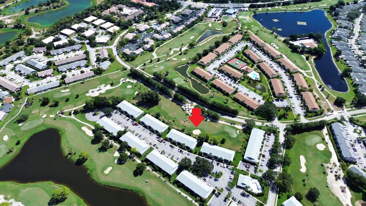 1101 Keystone Drive, Unit F Jupiter, FL 33458 - Photo 23 of 36 DJI_0851 w.arrow