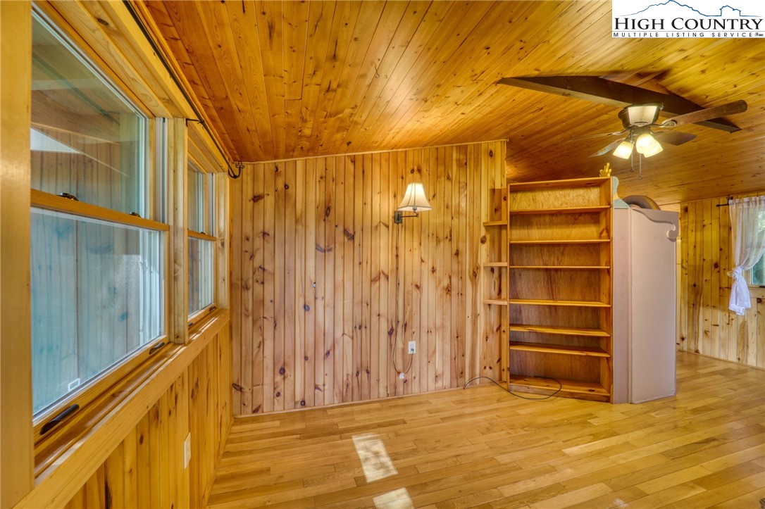 280 Chinkapin Ridge Road Seven Devils, NC 28604 - Photo 13 of 36 a view of a room with wooden walls