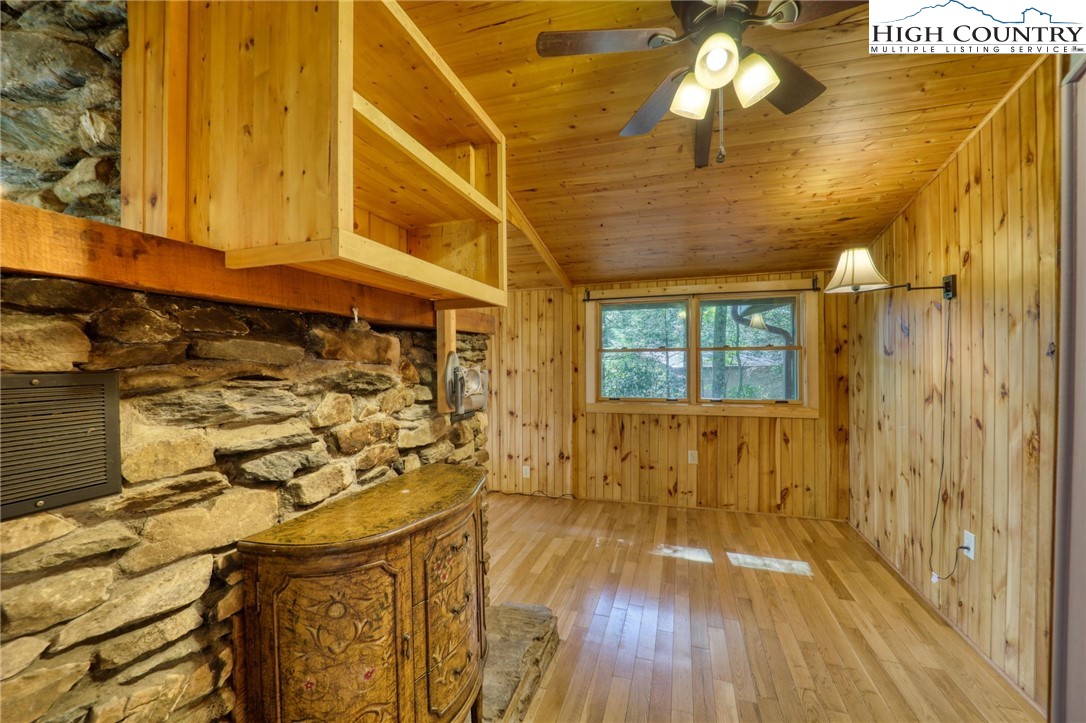 280 Chinkapin Ridge Road Seven Devils, NC 28604 - Photo 14 of 36 a view of a bathroom with wooden floor and a shower