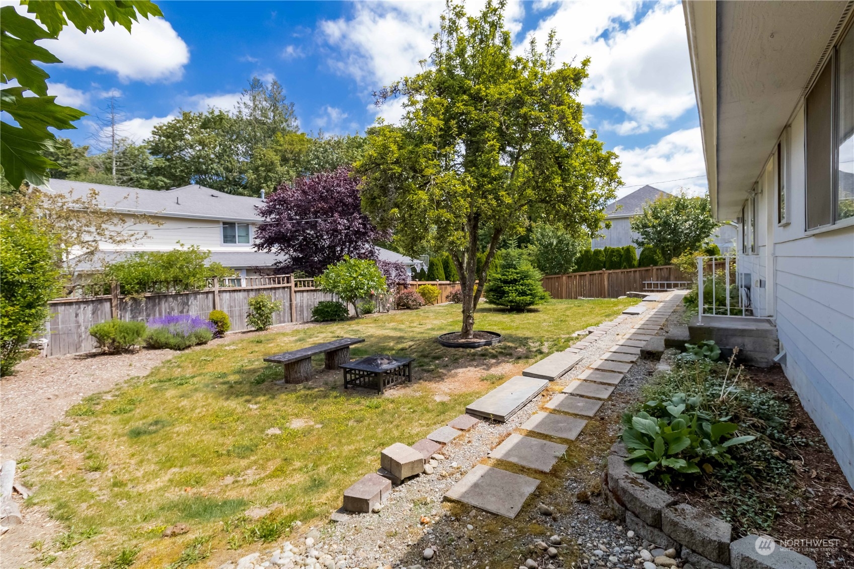 3816 Northeast 12th Street Renton, WA 98056 - Photo 30 of 39 a view of a backyard with swimming pool