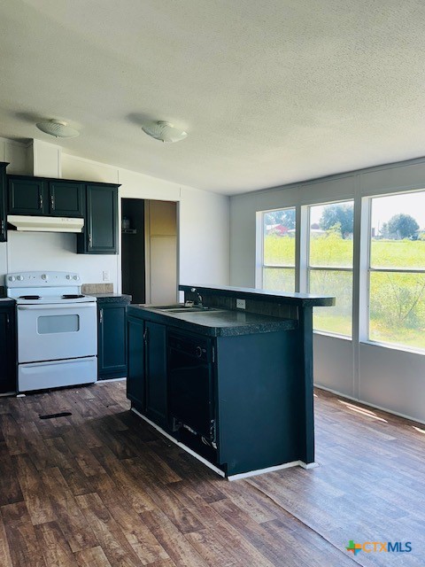 1212 Babylon Lane Schulenburg, TX 78956 - Photo 4 of 7 a kitchen with a refrigerator and window