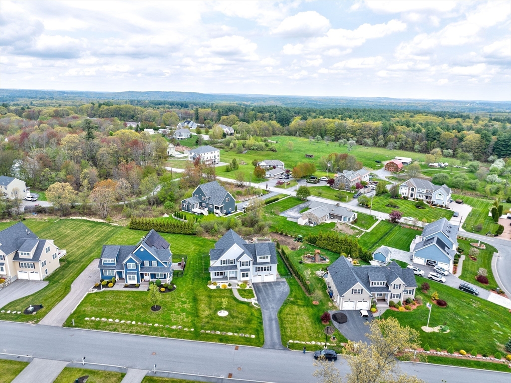 51 Tamarack Road Dracut, MA 01826 - Photo 36 of 39 an aerial view of residential houses with outdoor space and street view