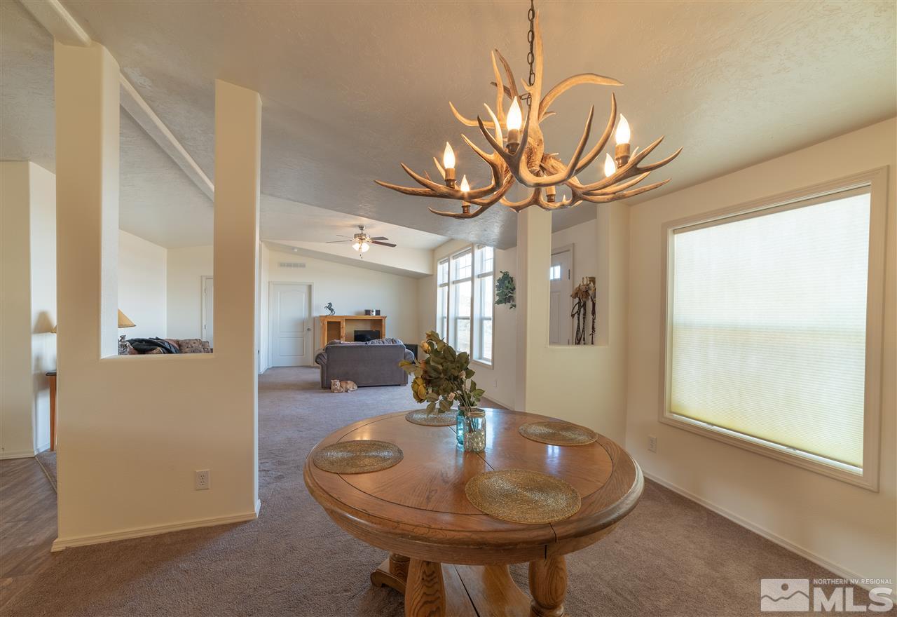 4600 Hidden Creek Road Reno, NV 89510 - Photo 9 of 25 a view of a livingroom with furniture and a chandelier