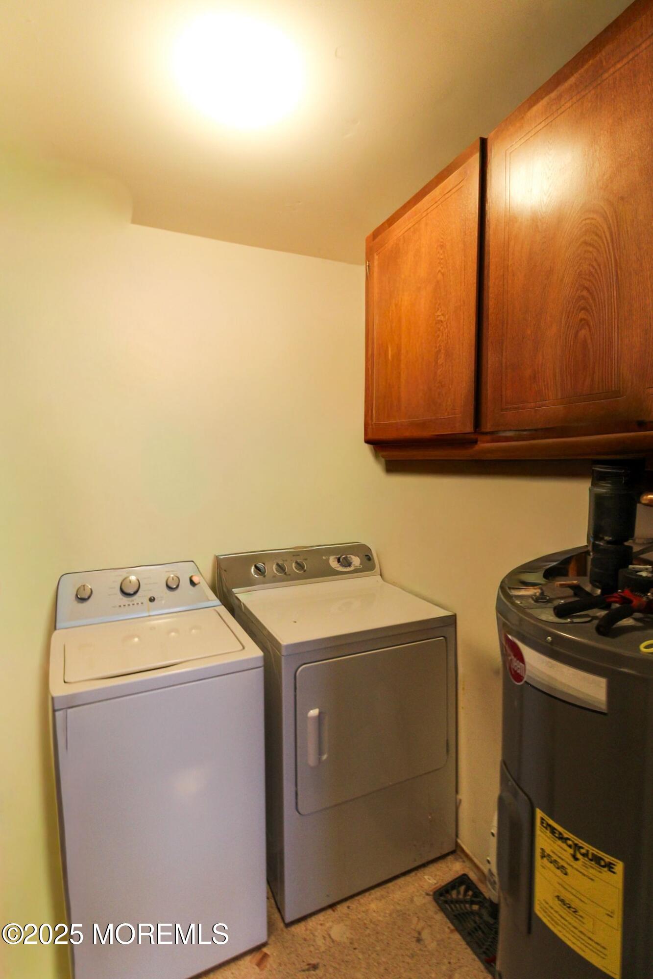24 Meadow Green Circle, Unit A Manalapan, NJ 07726 - Photo 11 of 24 a utility room with dryer and washer