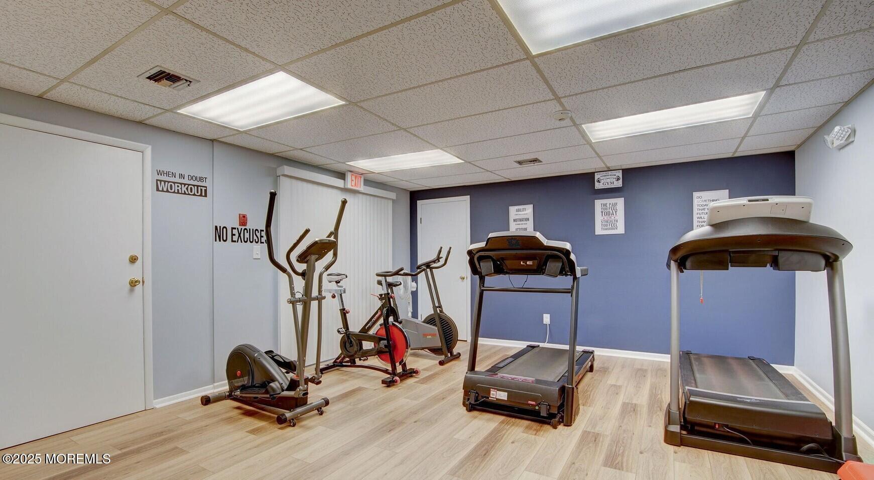 24 Meadow Green Circle, Unit A Manalapan, NJ 07726 - Photo 22 of 24 a view of gym room with gym equipment