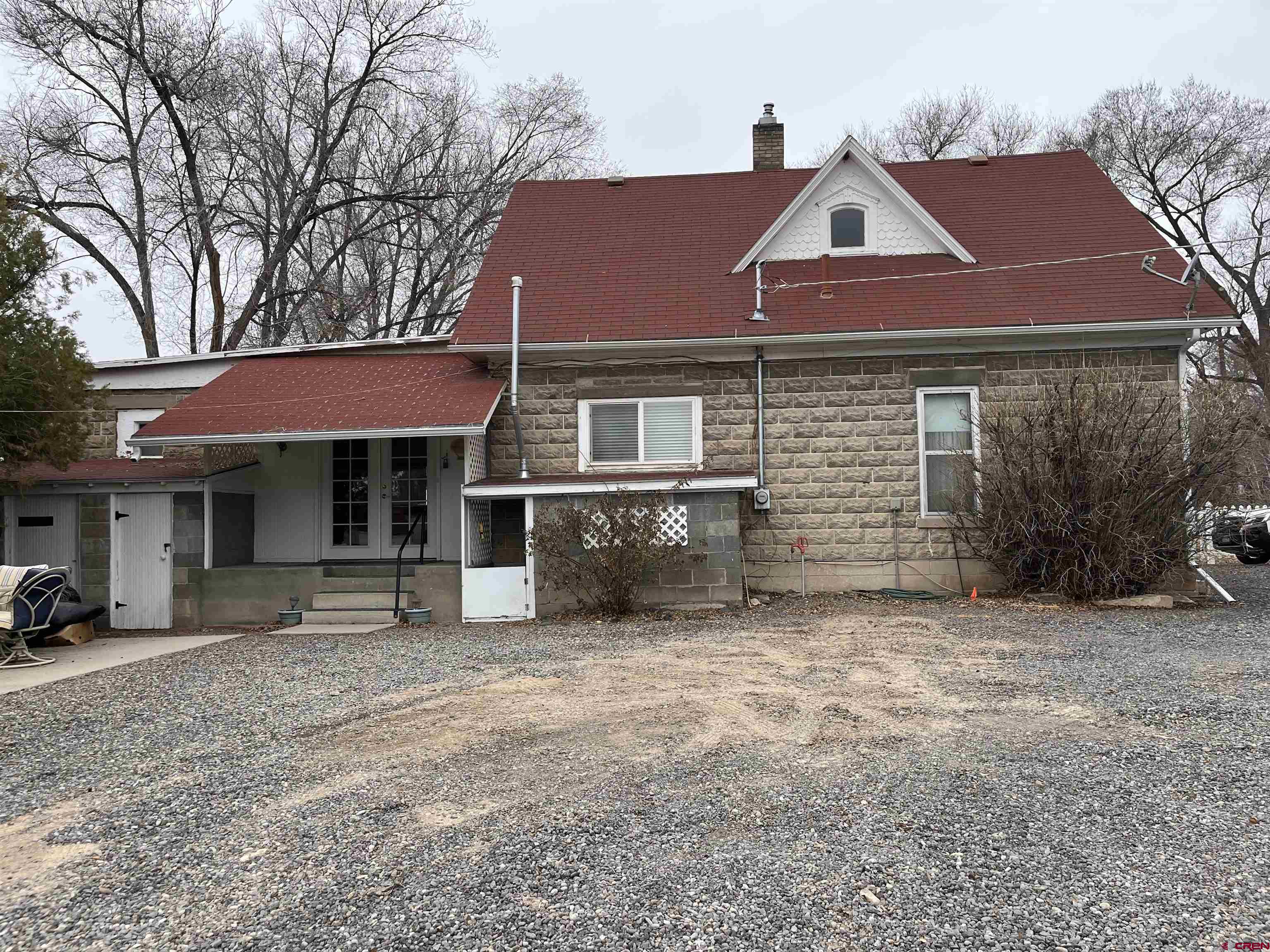 a front view of a house with yard