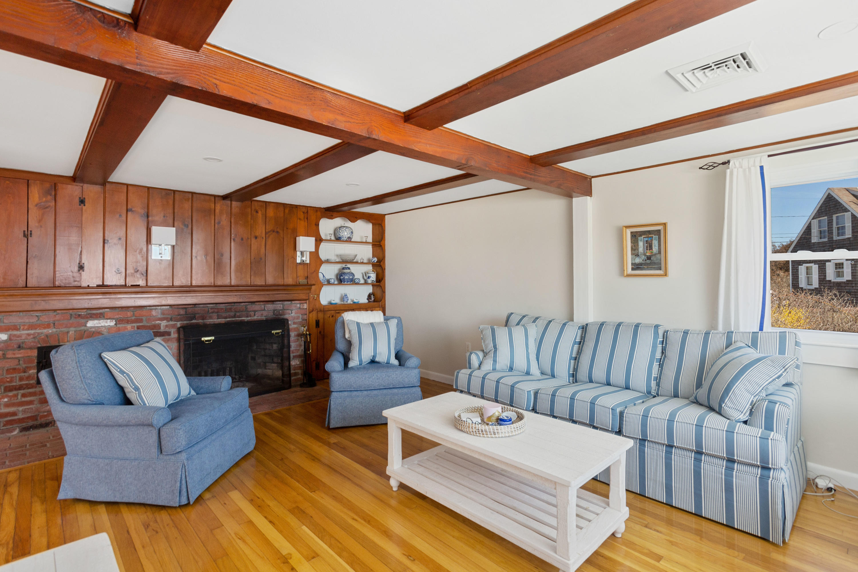 115 Seagull Road Chatham, MA 02633 - Photo 11 of 29 a living room with furniture and a large window