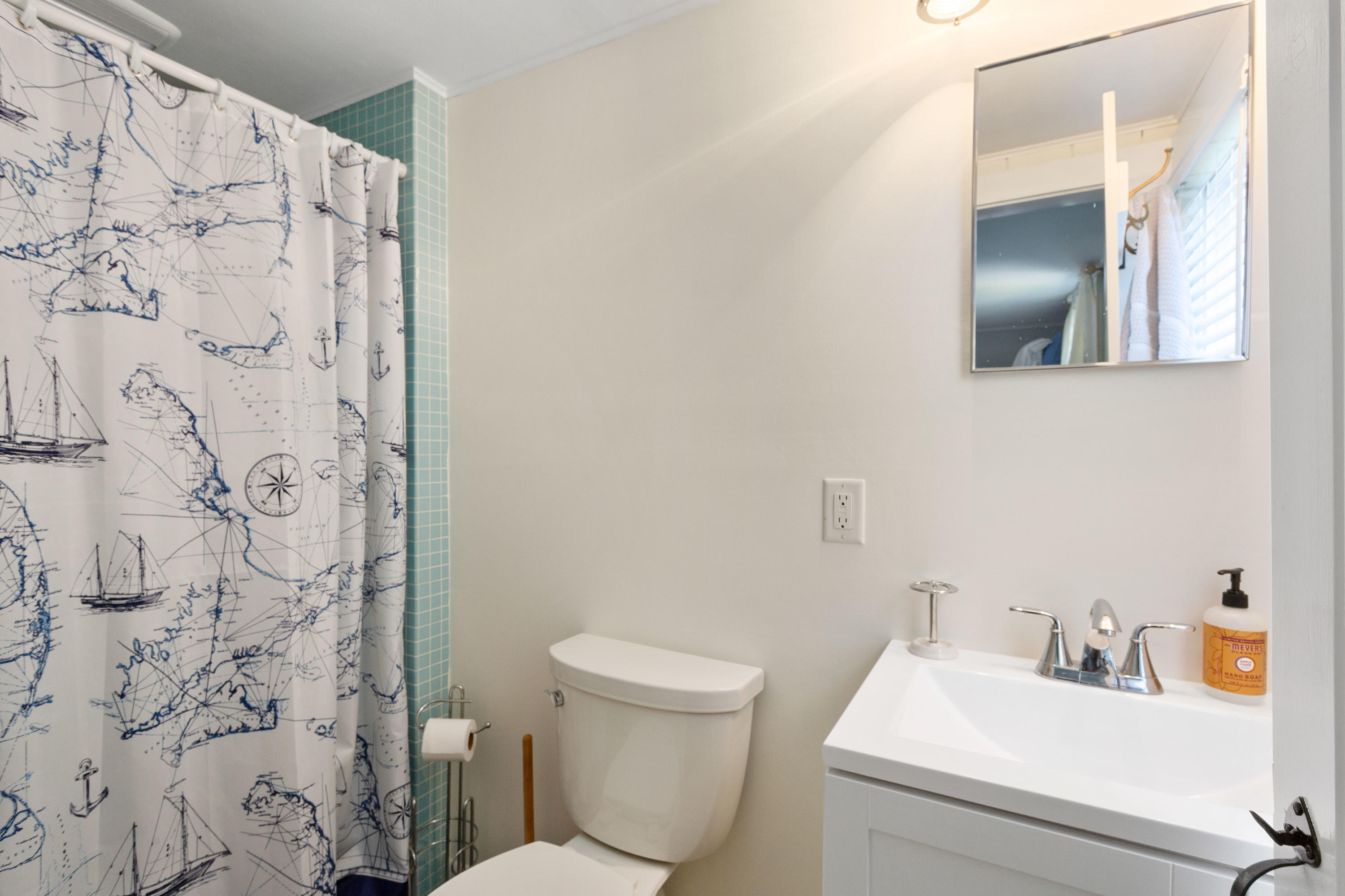 115 Seagull Road Chatham, MA 02633 - Photo 14 of 29 a bathroom with a toilet and a sink