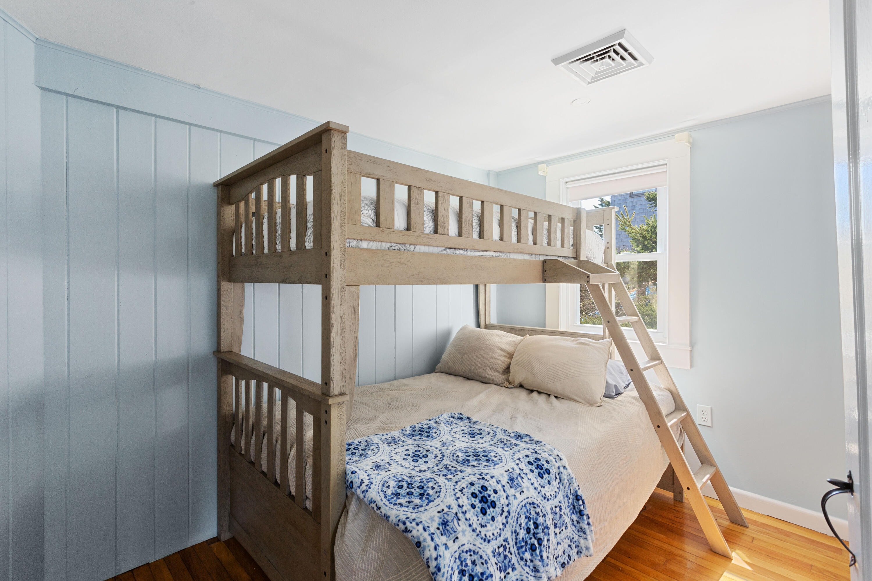 115 Seagull Road Chatham, MA 02633 - Photo 15 of 29 a bedroom with a bed and a window