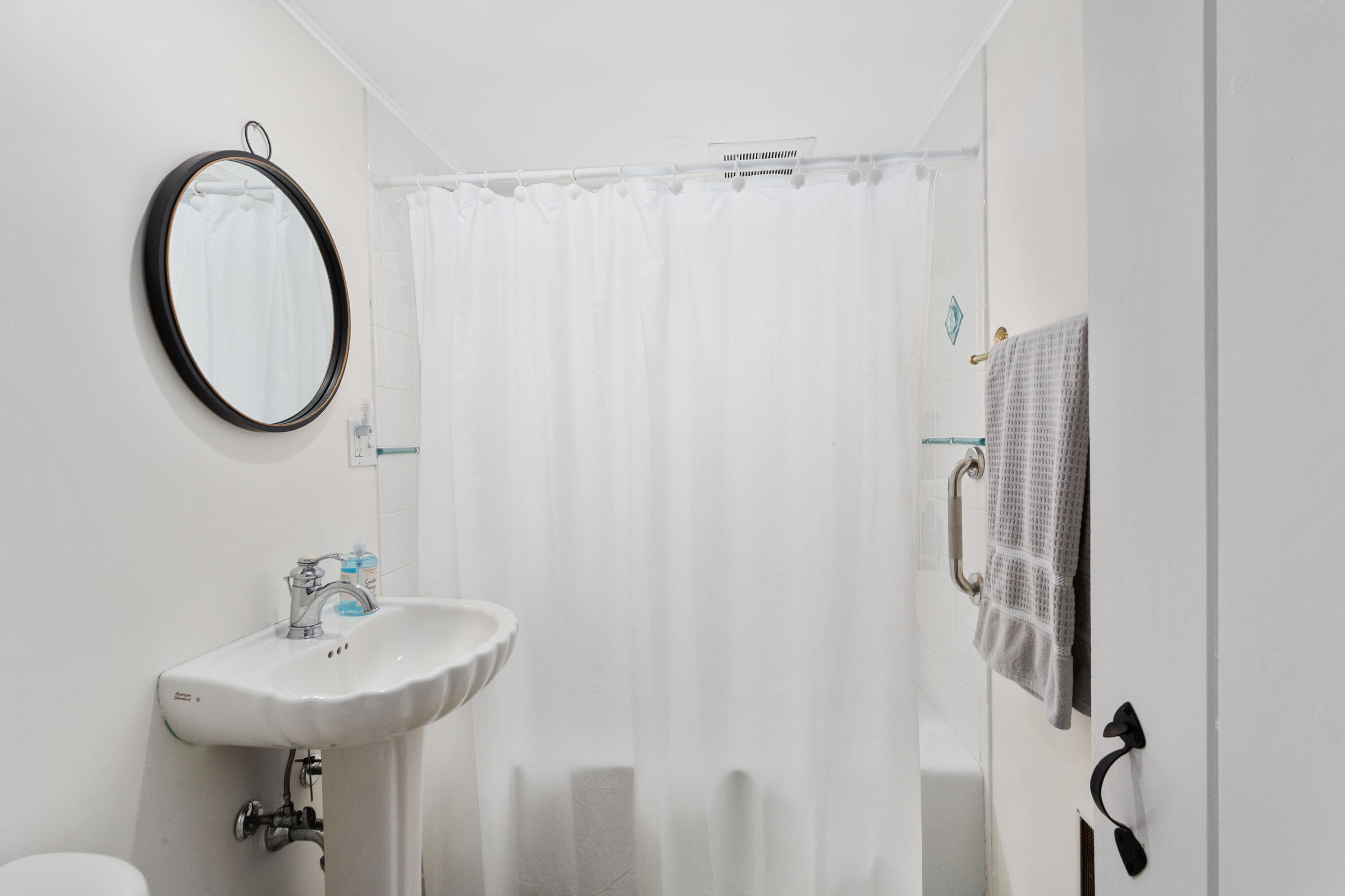 115 Seagull Road Chatham, MA 02633 - Photo 16 of 29 a bathroom with a sink a toilet and a mirror