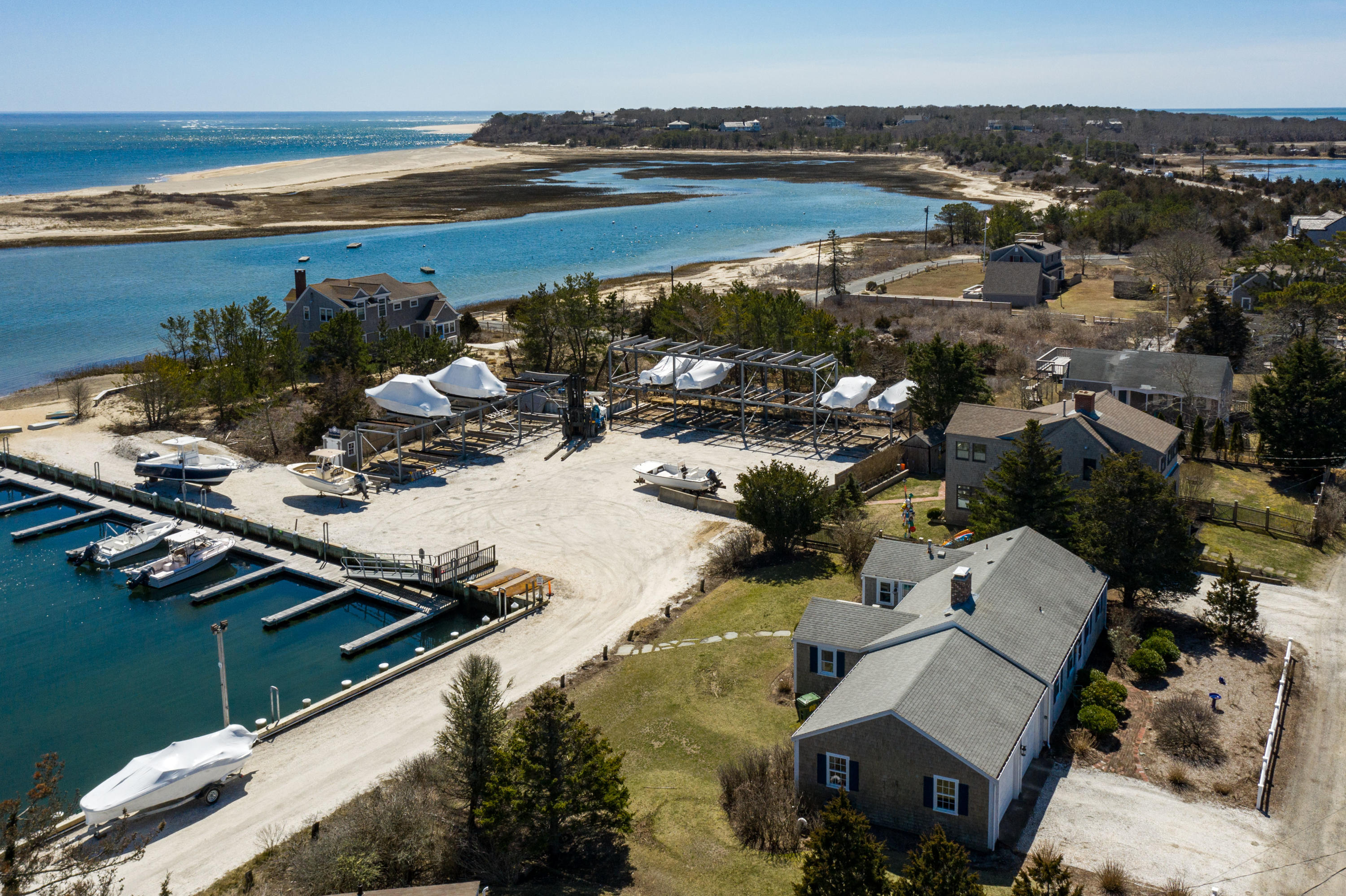 115 Seagull Road Chatham, MA 02633 - Photo 2 of 29 an aerial view of a house with a lake view