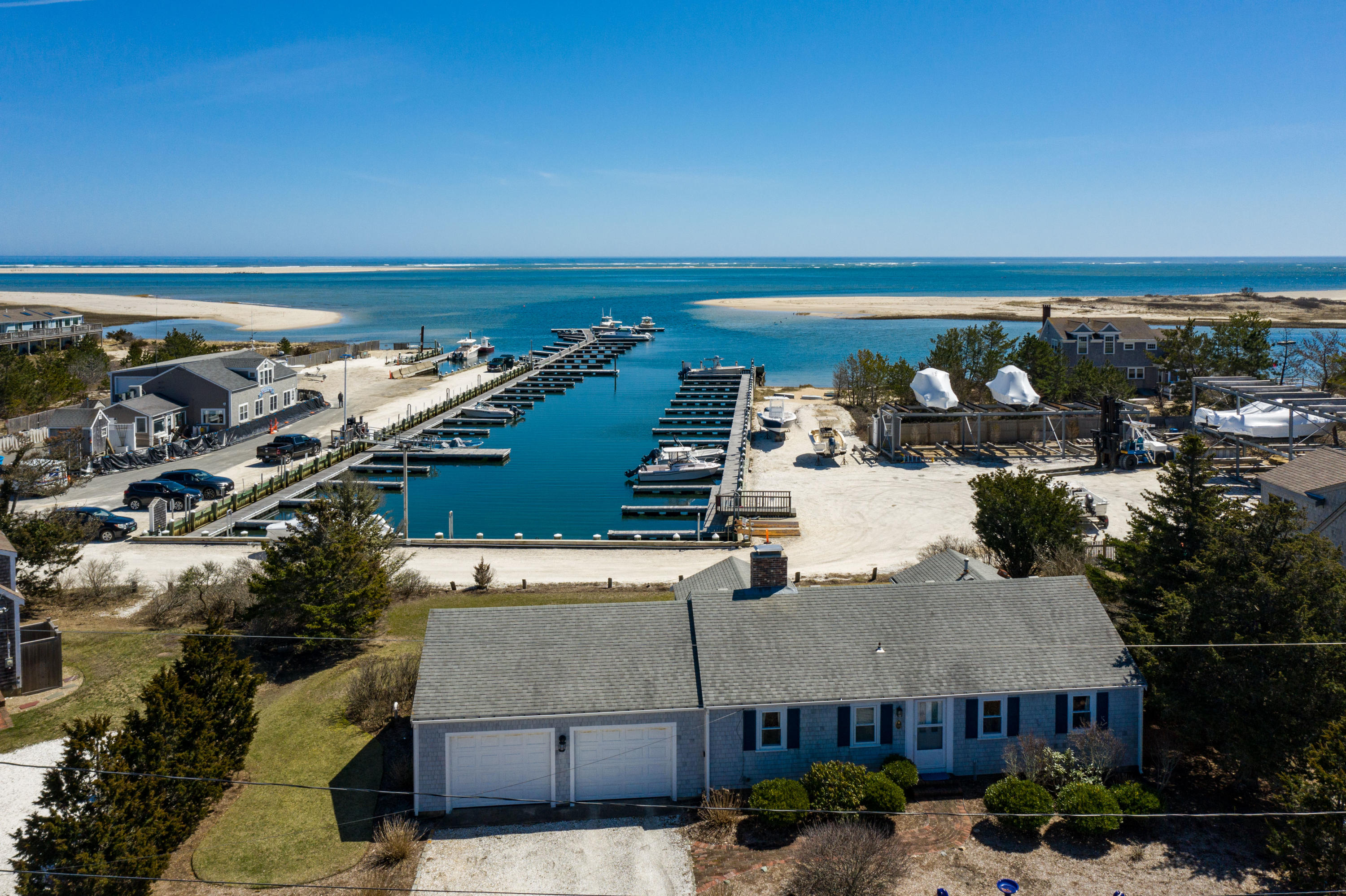 115 Seagull Road Chatham, MA 02633 - Photo 5 of 29 a view of a terrace with chairs