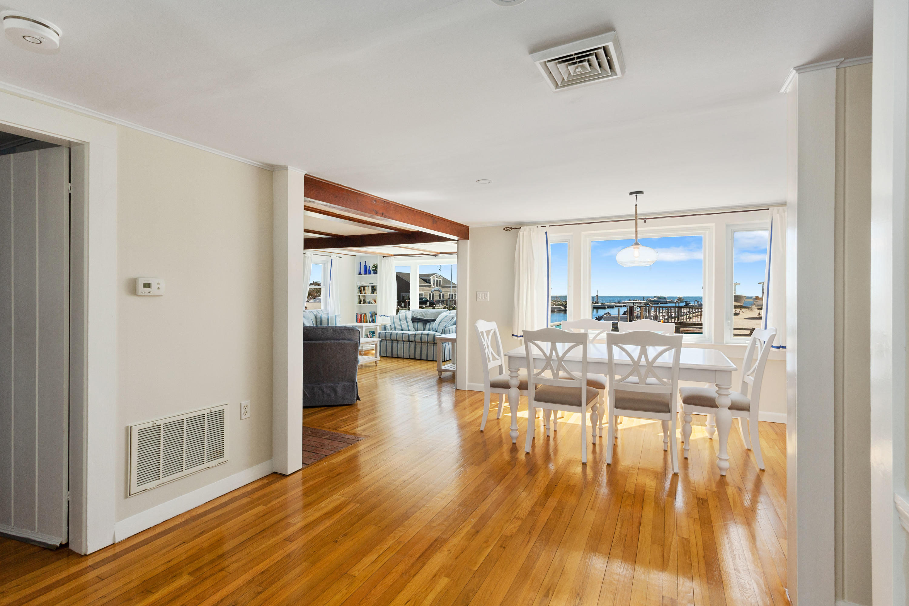115 Seagull Road Chatham, MA 02633 - Photo 7 of 29 a living room with furniture and a wooden floor