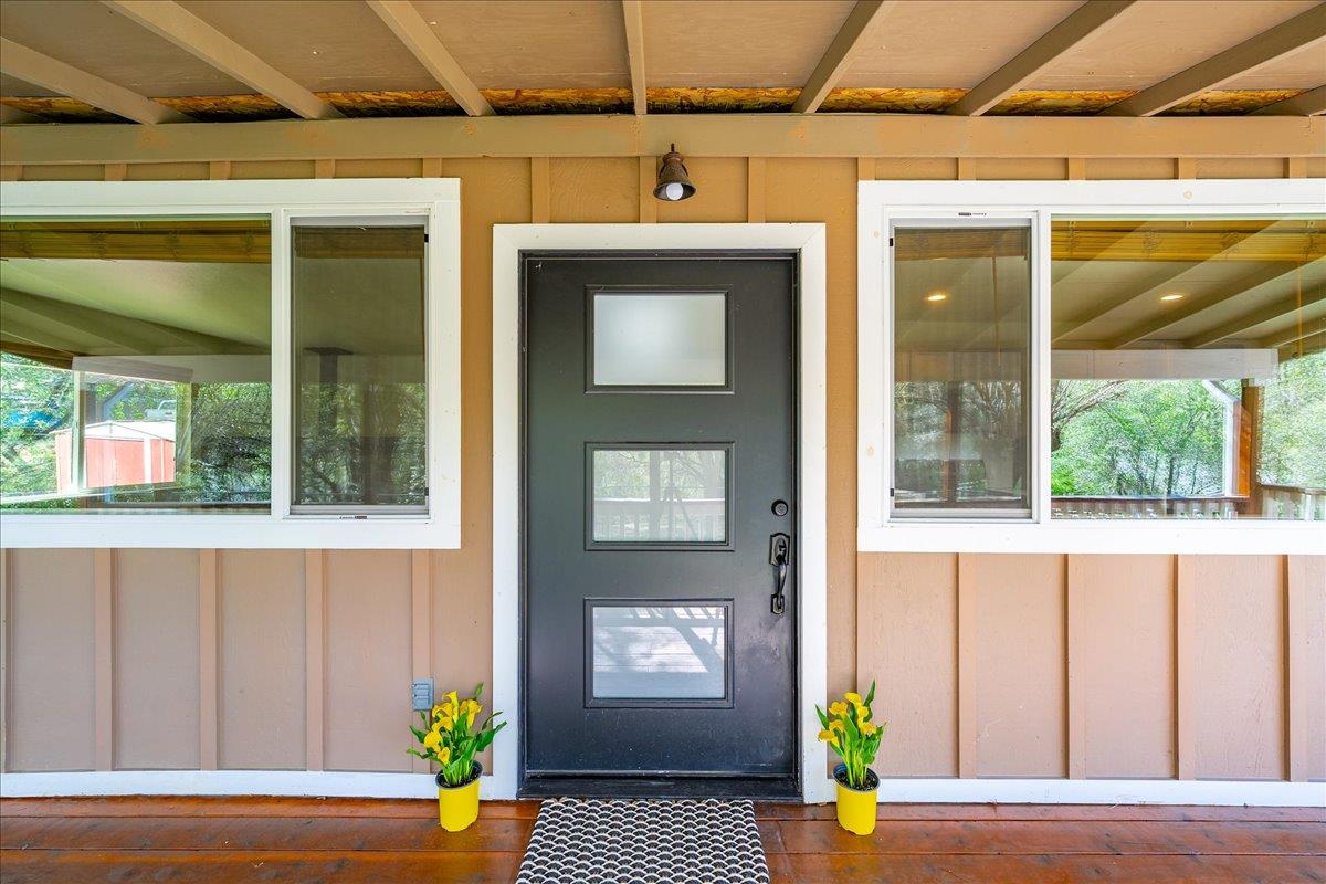 1302 Nicks Lane Placerville, CA 95667 - Photo 15 of 51 a front view of a house with a yard