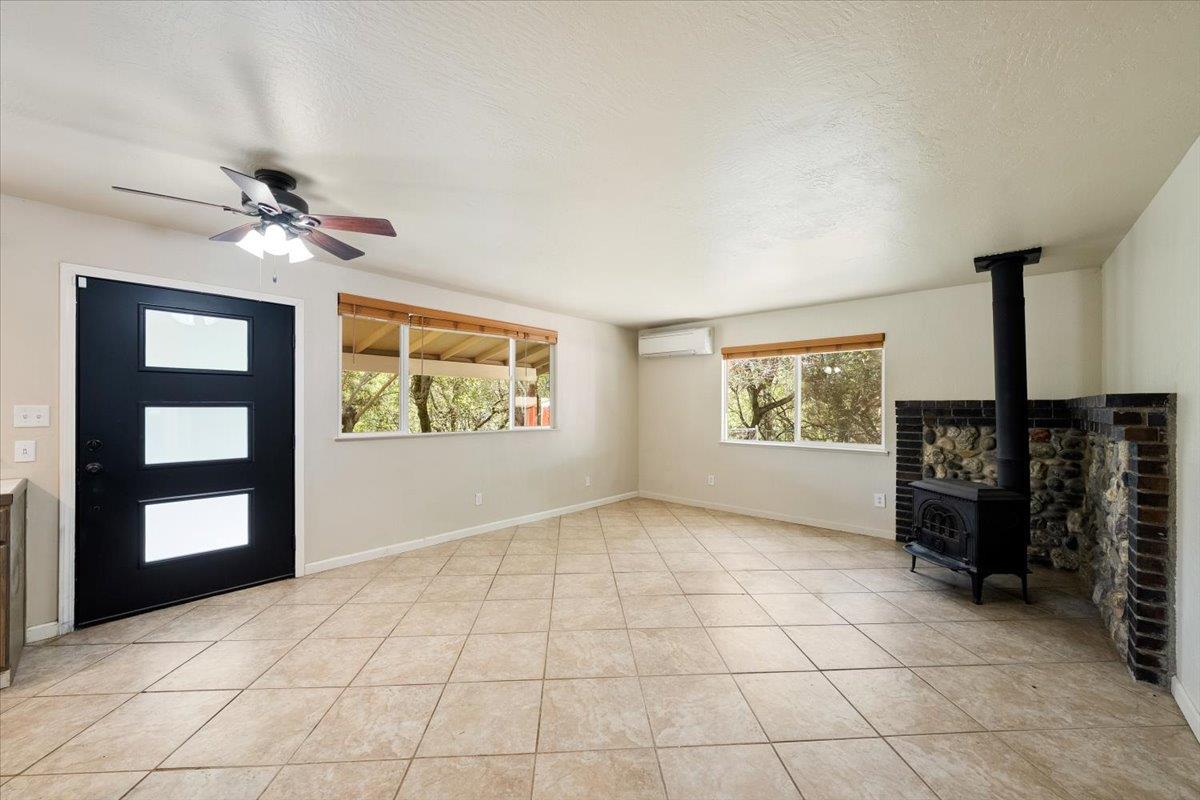 1302 Nicks Lane Placerville, CA 95667 - Photo 17 of 51 a view of an empty room with a window