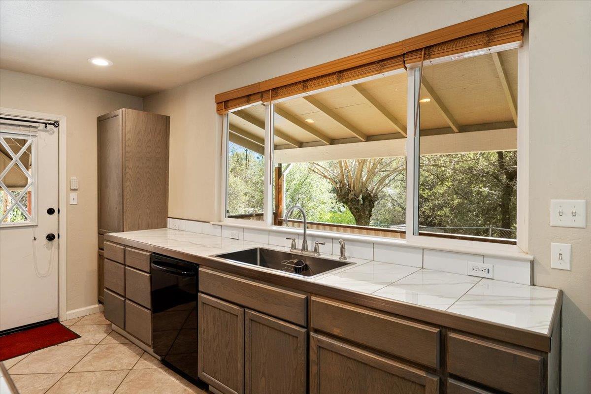 1302 Nicks Lane Placerville, CA 95667 - Photo 24 of 51 a view of a sink and a window