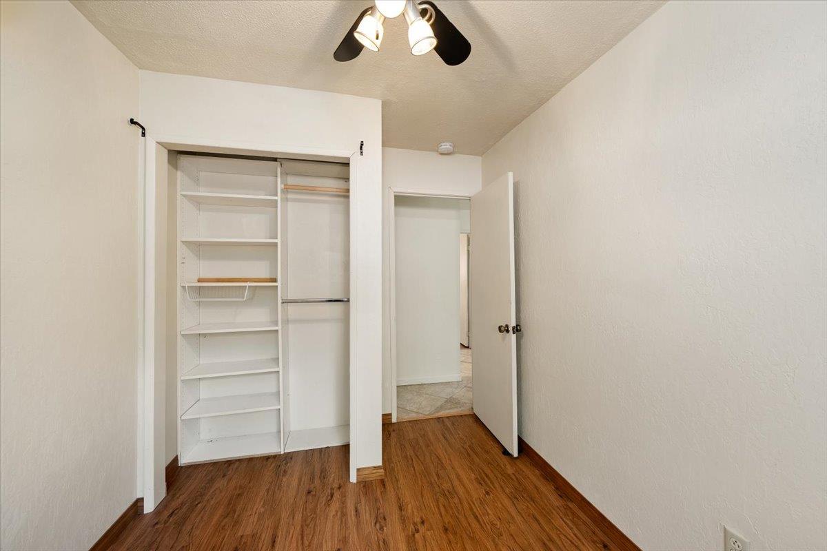 1302 Nicks Lane Placerville, CA 95667 - Photo 28 of 51 a view of walk in closet with wooden floor