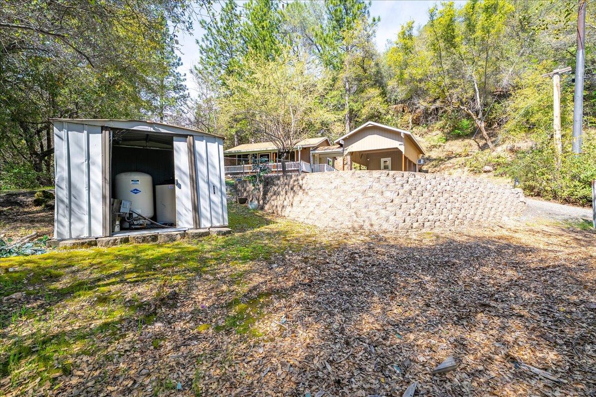 1302 Nicks Lane Placerville, CA 95667 - Photo 37 of 51 a view of a tiny house with a yard