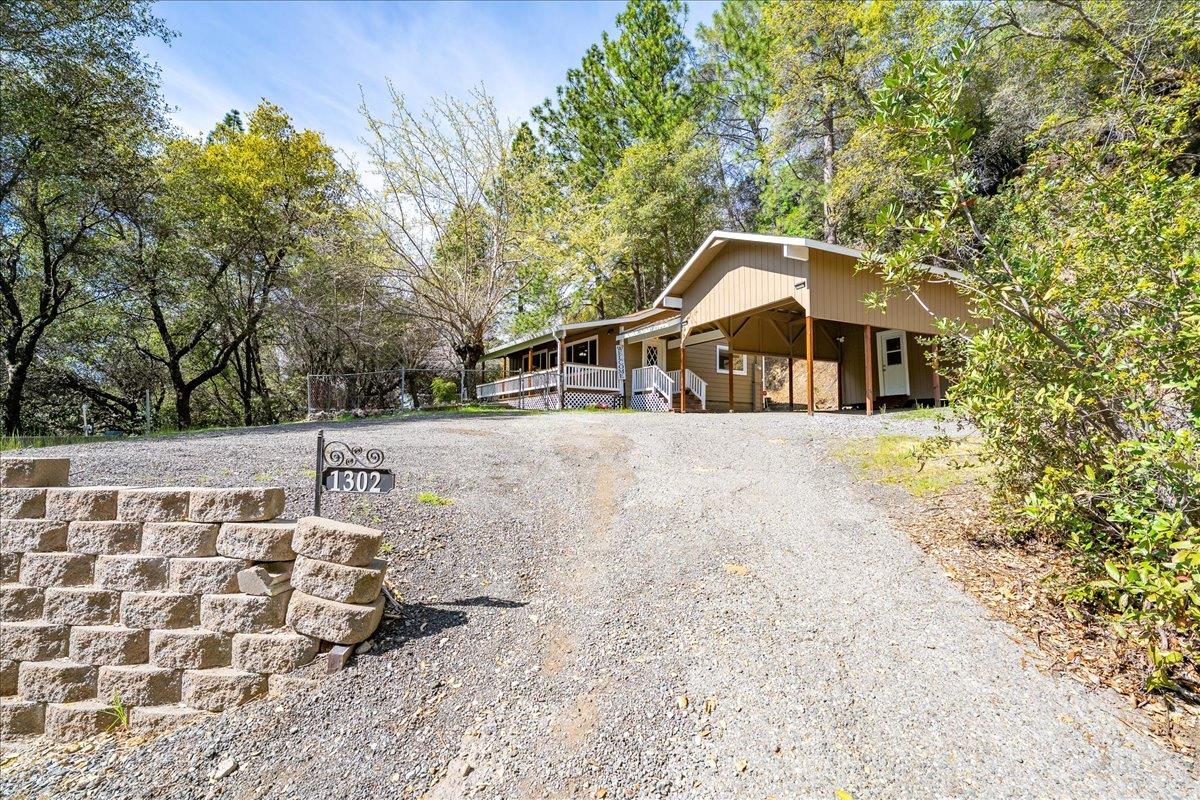 1302 Nicks Lane Placerville, CA 95667 - Photo 7 of 51 a view of a house with a yard