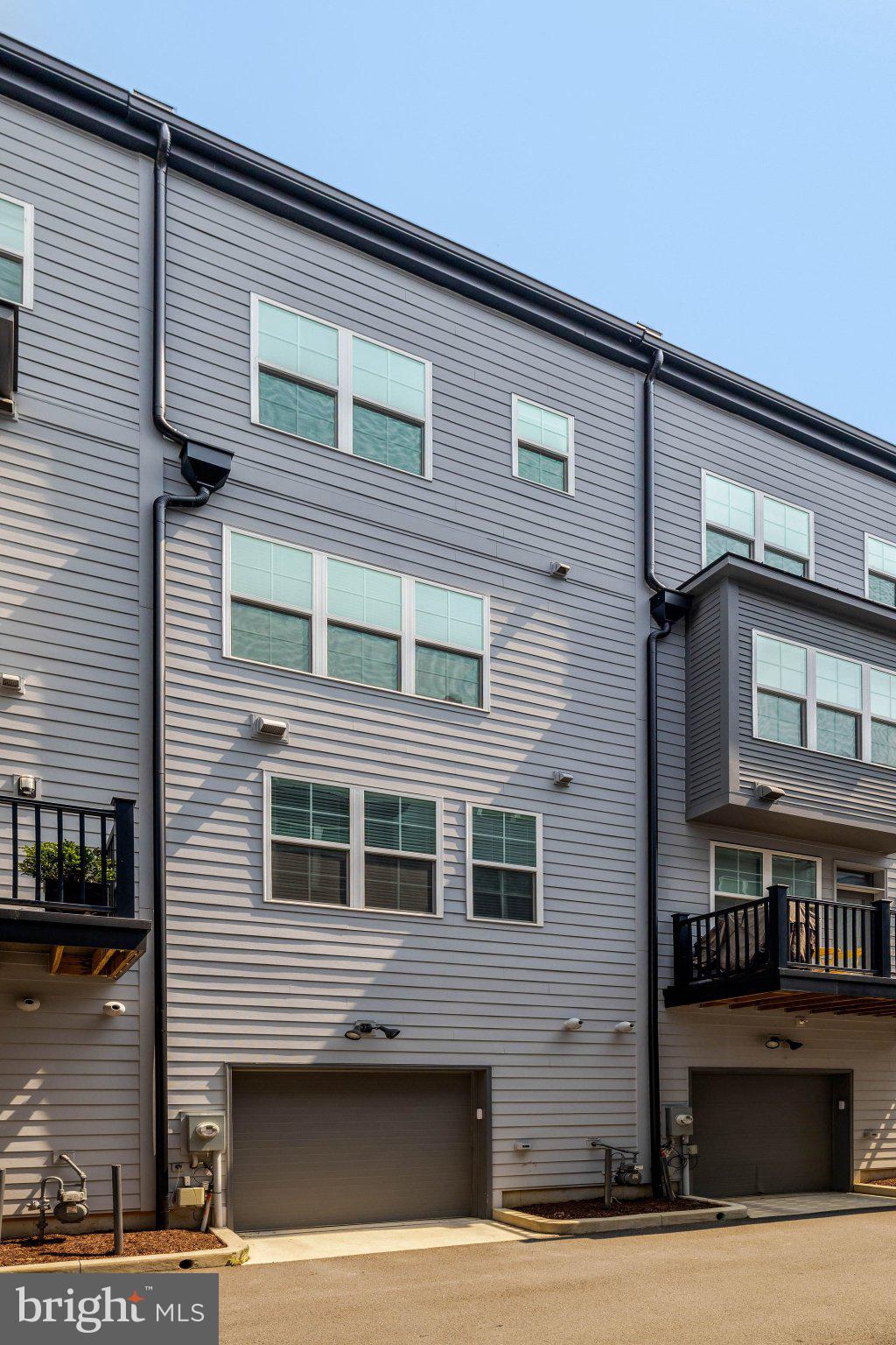 11247 Beaker Street Reston, VA 20190 - Photo 42 of 54 Modern townhomes with sleek design.