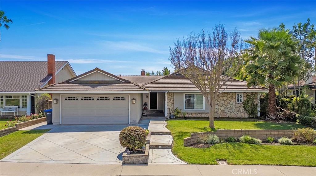 25532 Rhoda Drive Mission Viejo, CA 92691 - Photo 1 of 1 a front view of a house with garden