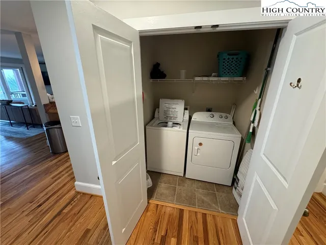 a room with gym equipment and a large window