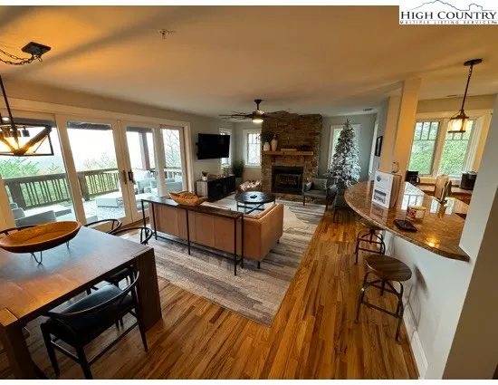 a view of a dining room with furniture window and outside view