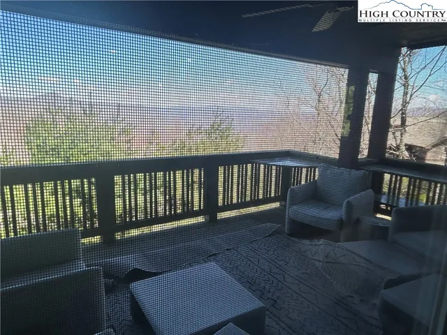 a view of mountain and a forest