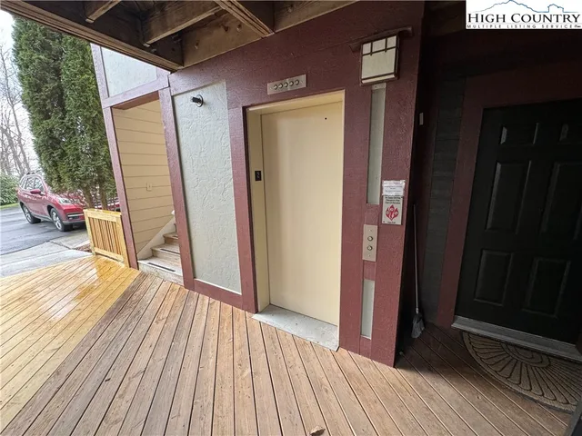 a view of a house with wooden floor and furniture