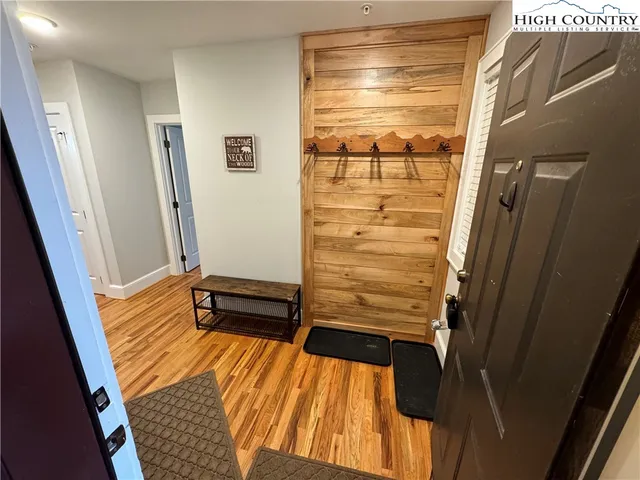 a view of room with window and hardwood floor